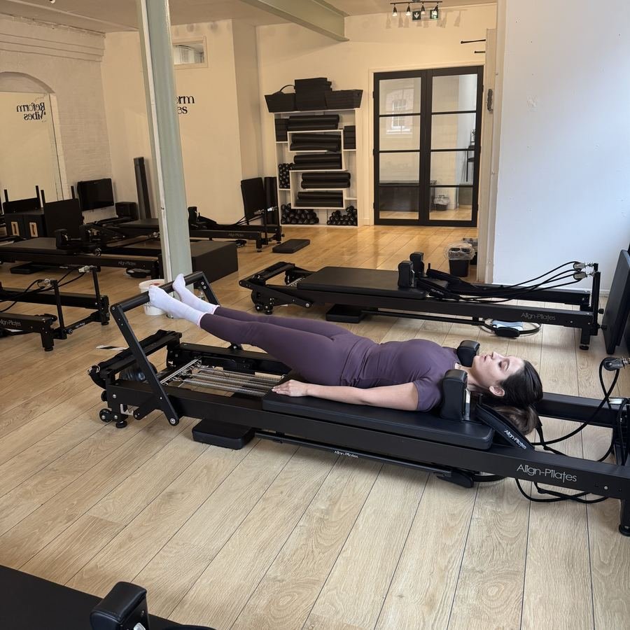 The Reform and Vibes studio on Tooley Street with a client on a reformer